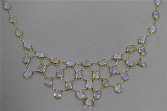 A 14ct gold and white opal fringe necklace, 43cm.